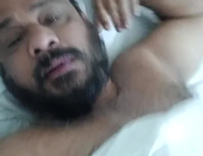 Indian Daddy Lying on the Bed Teasing and Posing for You