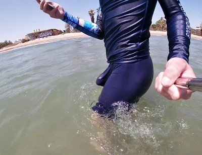 Surfer Gets Erect in His Lycra for the Pleasure of the People