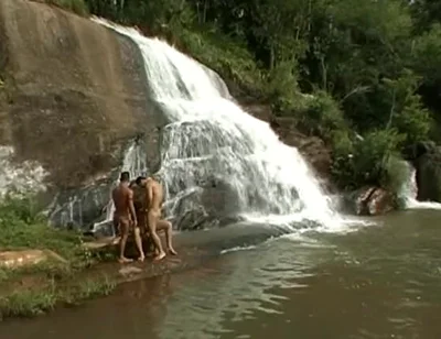 Three Nude in the River
