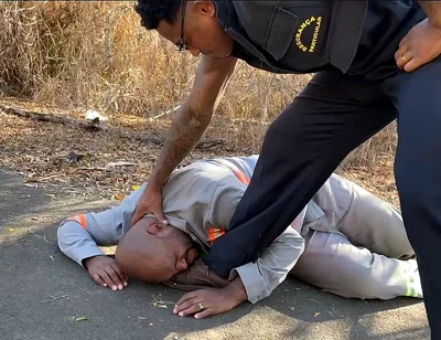 Vigilante Humiliating the Worker