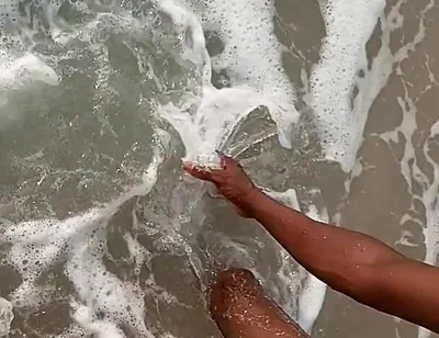 Having Fun on the Beach of Cotonou Alone for the First Time