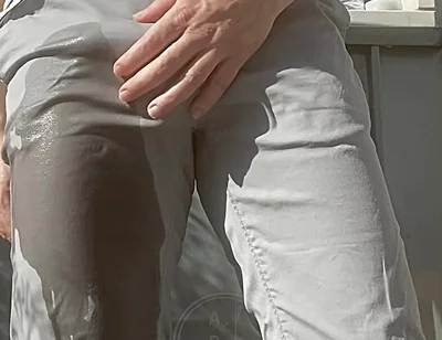 Jules Wets His Grey Pants and Exposes His Semi-hard Cock Through His Trousers