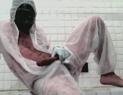 Masked Femboy in Suit Pees Itself and Cums