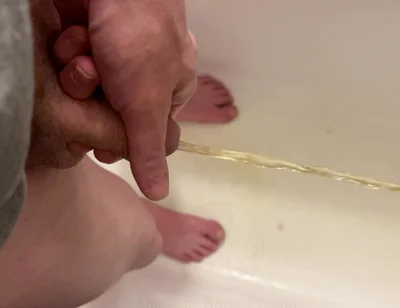 Amateur Boy Pissing, with Close-up and Good Quality Slow Motion of the Load of Pee Coming Out of the Pee-hole (urethra)