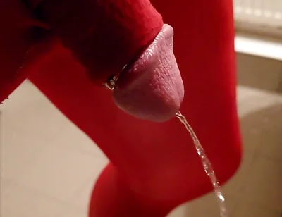 Pissing at Home in Red Legging with Penis Sleeve