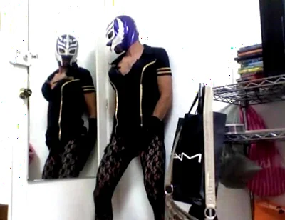 Masked Sissy Crossdresser in Dress and Stockings and Corset Lingerie