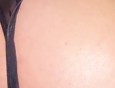 A Gay Man Dressed as a Woman Moves in a Seductive Manner.