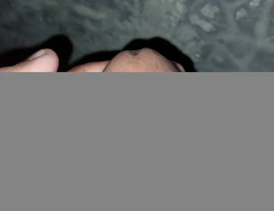 The Gay Boy Went to the Toilet, Turned on the Flash Light on His Mobile Phone, and Started Licking His Private Parts with Spit.