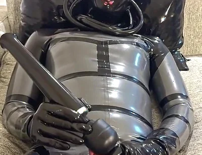 Latex Alien Enjoying with the Vibrator