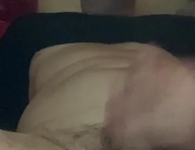 Masturbating