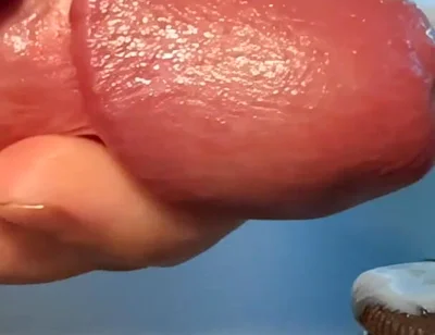 Slow-mo Oreo Cumshot: Dripping Sperm Load on Cookie Close-up!