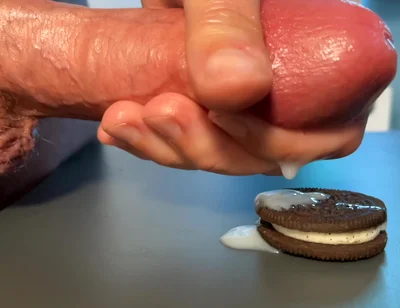 Slow-mo Oreo Cumshot: Dripping Sperm Load on Cookie Close-up!
