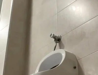 Amateur Twink Boy and Older Guy Caught Having Risky Fun in the Pool's Public Toilets