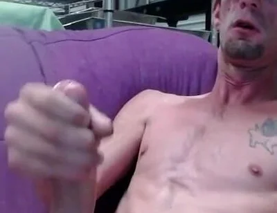 Masturbating