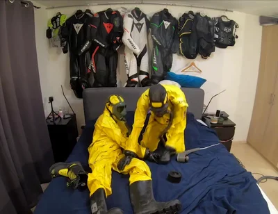 Vacuuming in tellchen hazmat suits