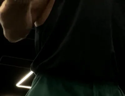 Doing a Biceps Curls with a Straight Barbell