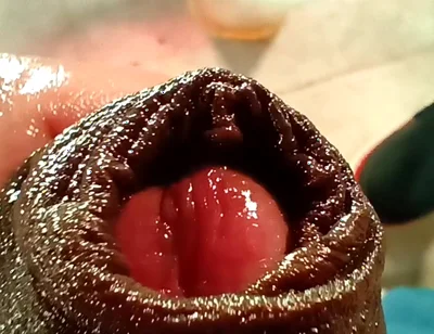 Sexy Colombian Man Urinating and Playing with His Foreskin