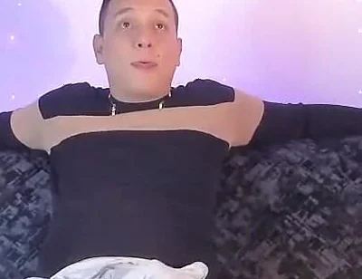 Latino Shows off His Bump on Camera Inside His Gray Sweatshirt