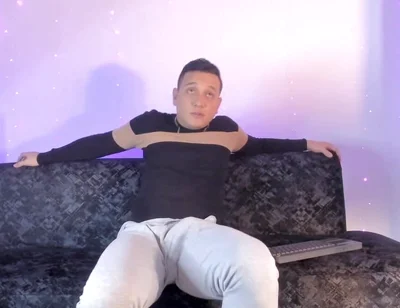 Latino Shows off His Bump on Camera Inside His Gray Sweatshirt