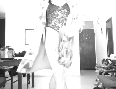 She Happily Opens Her Autumn Coat and Shows Everything That Is Underneath.