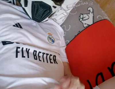 The Guy Is Wearing a Soccer Uniform and Mxhelmet with a Morning Cum