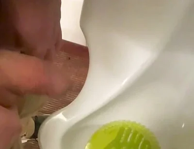 Amateur Redhead Guy Caught Pissing in a Public Toilet's Urinal - He Then Quickly Plays with His Cock Before Leaving