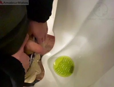 Amateur Redhead Guy Caught Pissing in a Public Toilet's Urinal - He Then Quickly Plays with His Cock Before Leaving