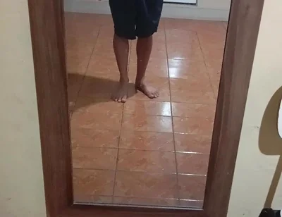 Boy in Shorts in the Mirror