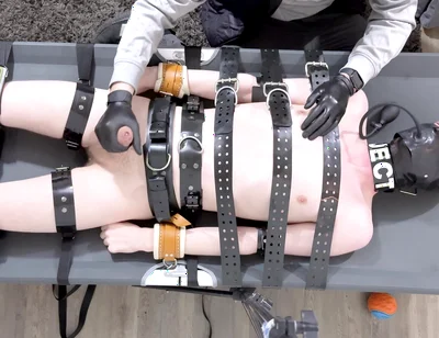 Rubber Twink Strapped Down and Made to Eat His Own Cum