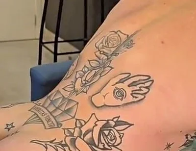 Big Tattooed Guy with a Tight Ass