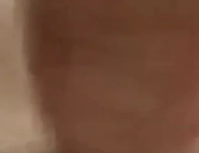 Masturbating