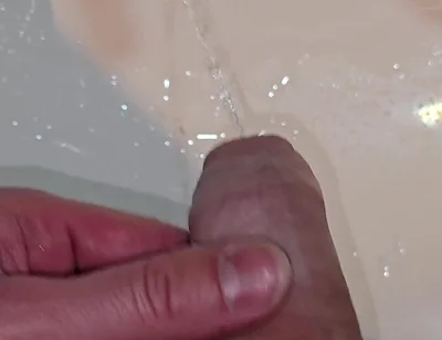 Pissing to the Bathroom Sink
