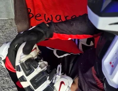 An Excited Guy in Motorcycle Gear Fucks His Sneakers