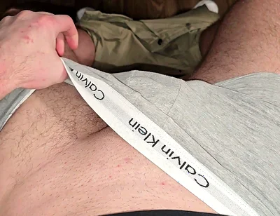 German masked guy rubs huge bulge.. grey Calvins down.. cock dripping heavy