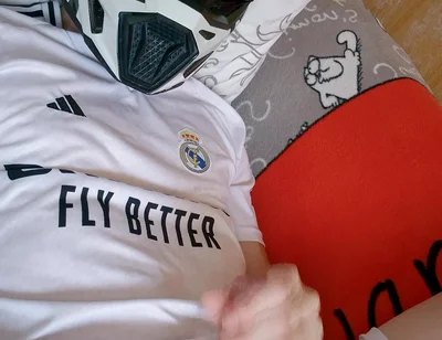 The Guy Is Wearing a Soccer Uniform and Mxhelmet with a Morning Cum