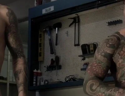 Two Friends in the Mechanic's Workshop