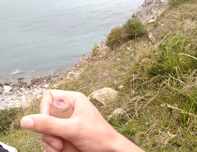 Big Beautiful Big Fat Cock Gets Handjob on the Beach with Gorgeous Sea Views