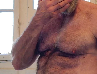 Hairy Muscle Daddy Strokes Uncut Cock