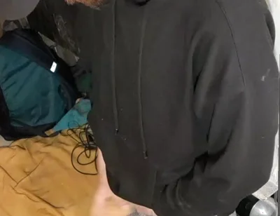 I Masturbate in Sweatpants, a Black Sweatshirt and Nike Sneakers