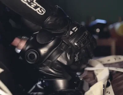 Rubber boy sucking biker master cock