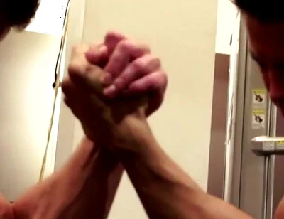Amateur Fitness Guys Arm Wrestle in the Gym