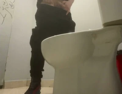 Amateur Friends Pissing Together in the Club's Toilets