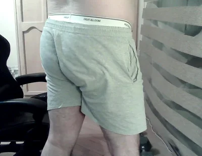 Muscular Camboy Flexes His Muscles and Squats