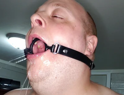 Deepthroating a 7 Inch Dildo with Mouth Gag Ring