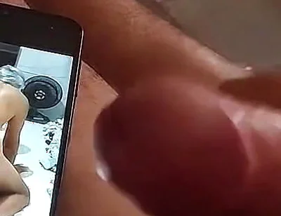 Ladysilva Masturbating Her Hot Cock Watching Her Video on Her Cell Phone
