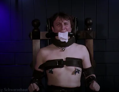 Rikki in Bondage Chair Steel Gag System & Sock Stuffing