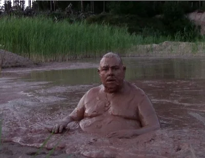 Mud Bath in Deep Quarry Mud Pond