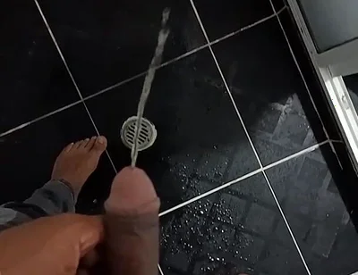 Urinating in Dark Jeans