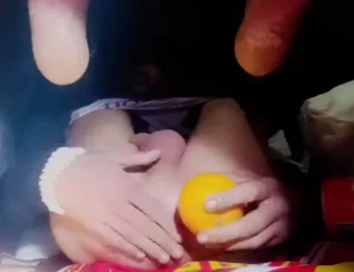 A Young Man Stuffs a Crystal Ball and an Orange up His Tight Ass.