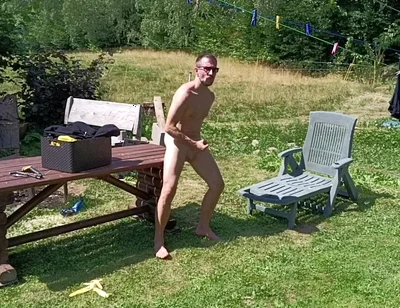 Jerking off While Hanging Out the Laundry